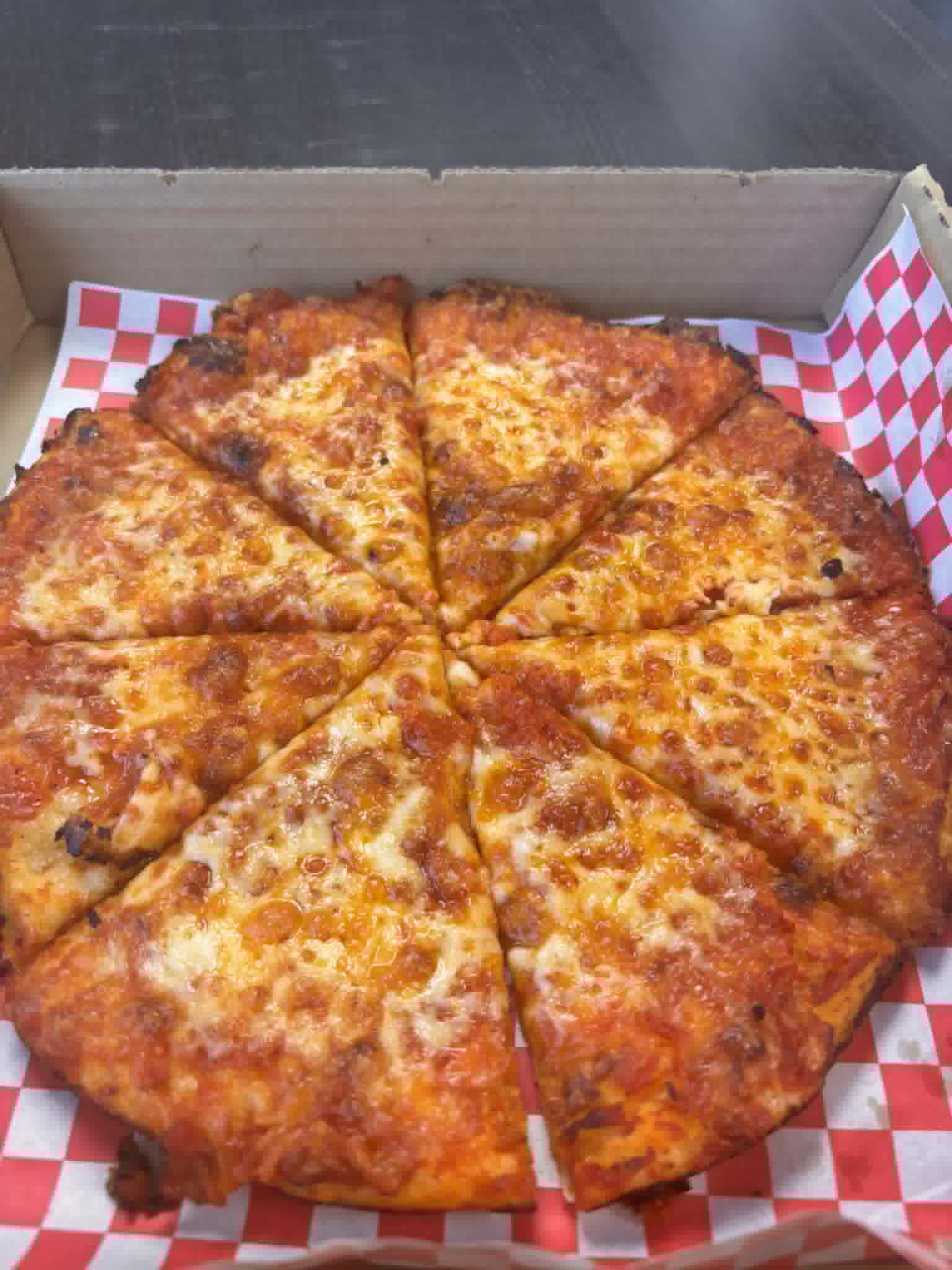 Classic cheese pizza with golden melted mozzarella